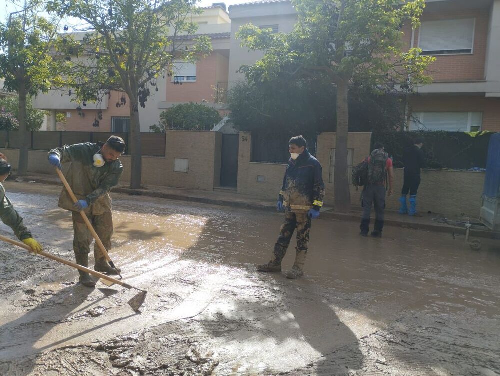 Imágenes de las labores que han realizado los voluntarios de Protección Civil de Guadalajara en la comunidad valenciana.